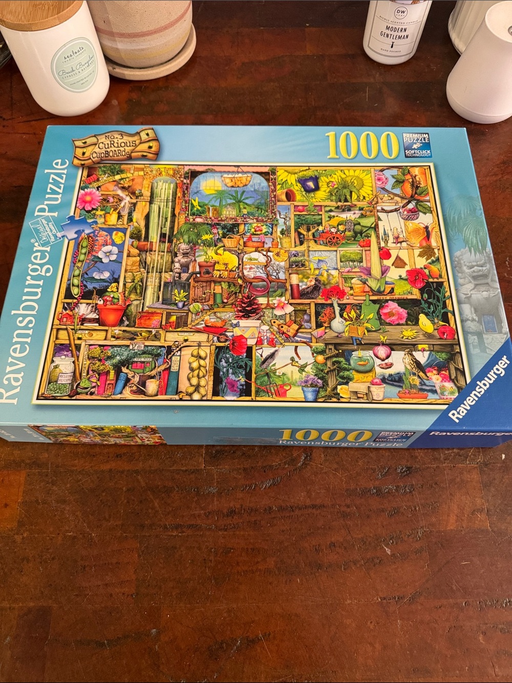 Ravensburger Colorful Curious Cupboard 1000-Piece Puzzle - Blue Box Art